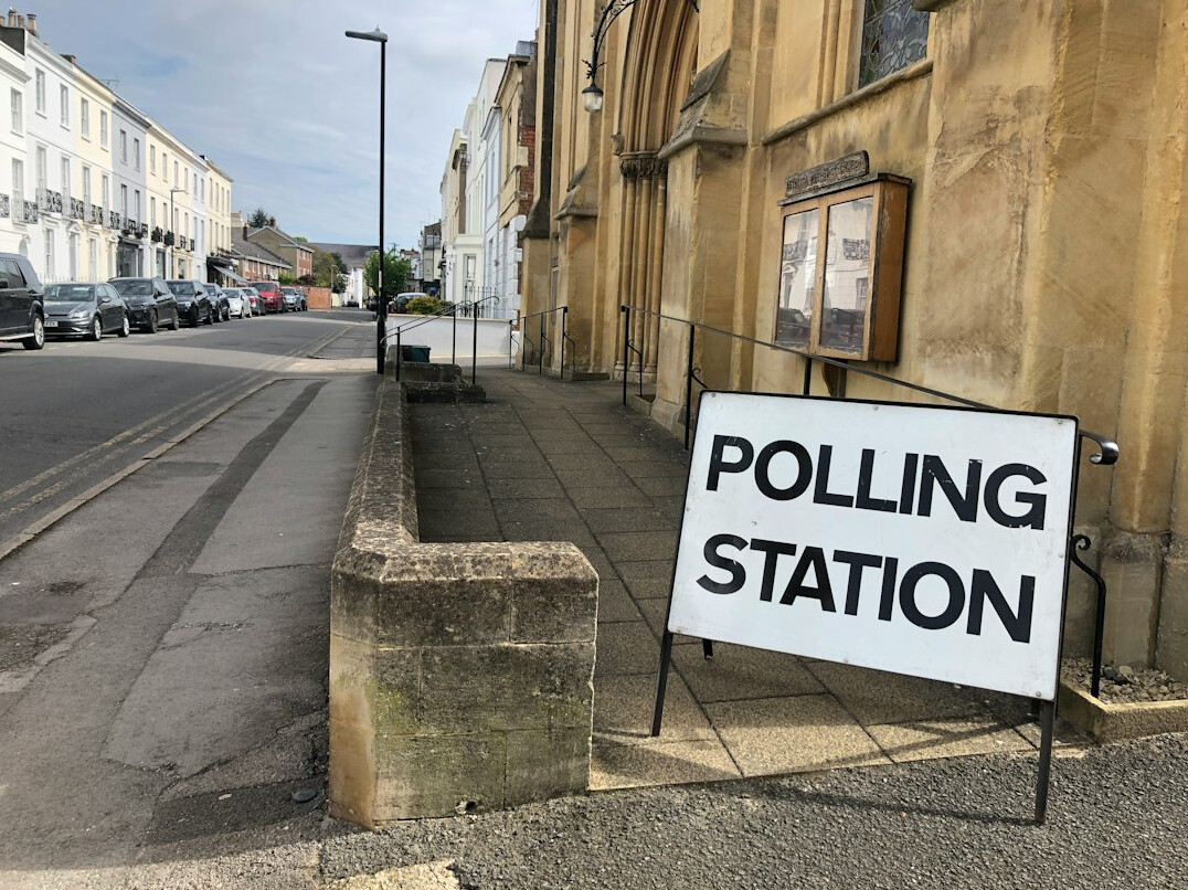 people voting at polling station
